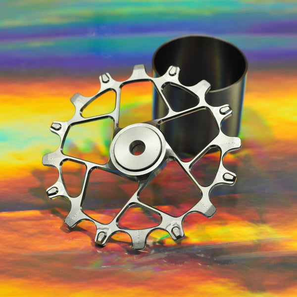 Sturdy machined titanium jockey wheel, webbed style