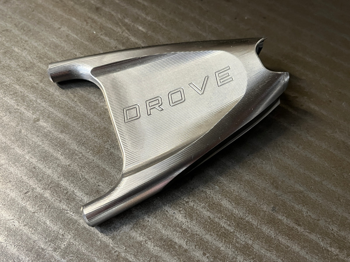 Machined titanium seat stay yoke engraved with Drove